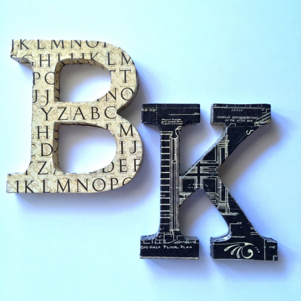 Repeat the process with the other letter. Then spread some decoupage glue on the surface of all the letter and let it dry.