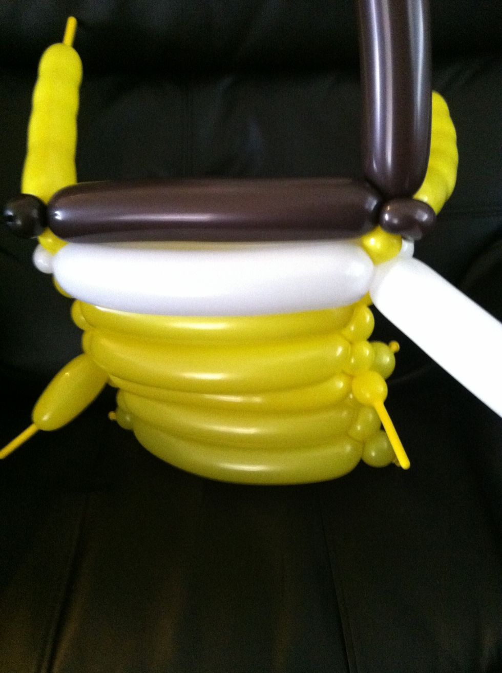 Repeat the process you just did with the white balloon