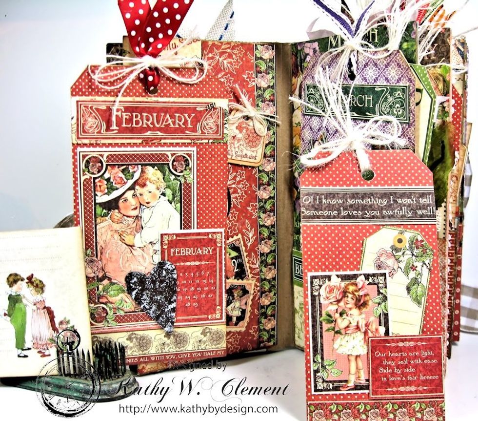 Repeat the same process  for each month. Decorate all the pages before securing to the hinges.