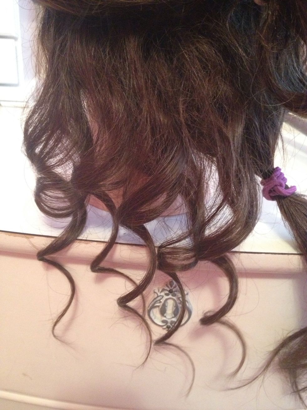 Repeat the same process until you have curled each piece of hair in that section.