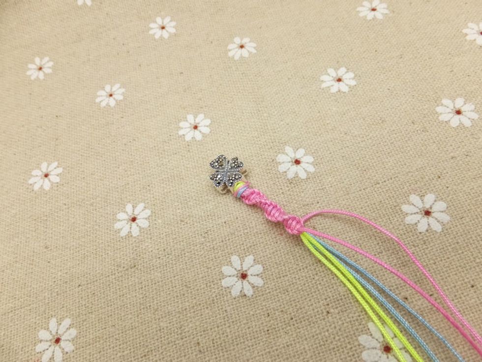 Repeat the same steps 4 and 5. Continue braiding the rest of cord and you\u2019ll create the spiral pattern.