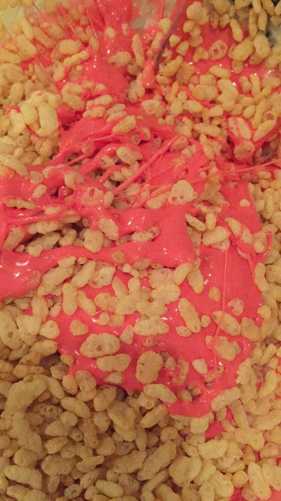 Repeat the same steps as previously. This time you'll be using the remaining 2/3 of your marshmallows and Rice Krispies. Add the red food coloring until you get a pinkish-red color.