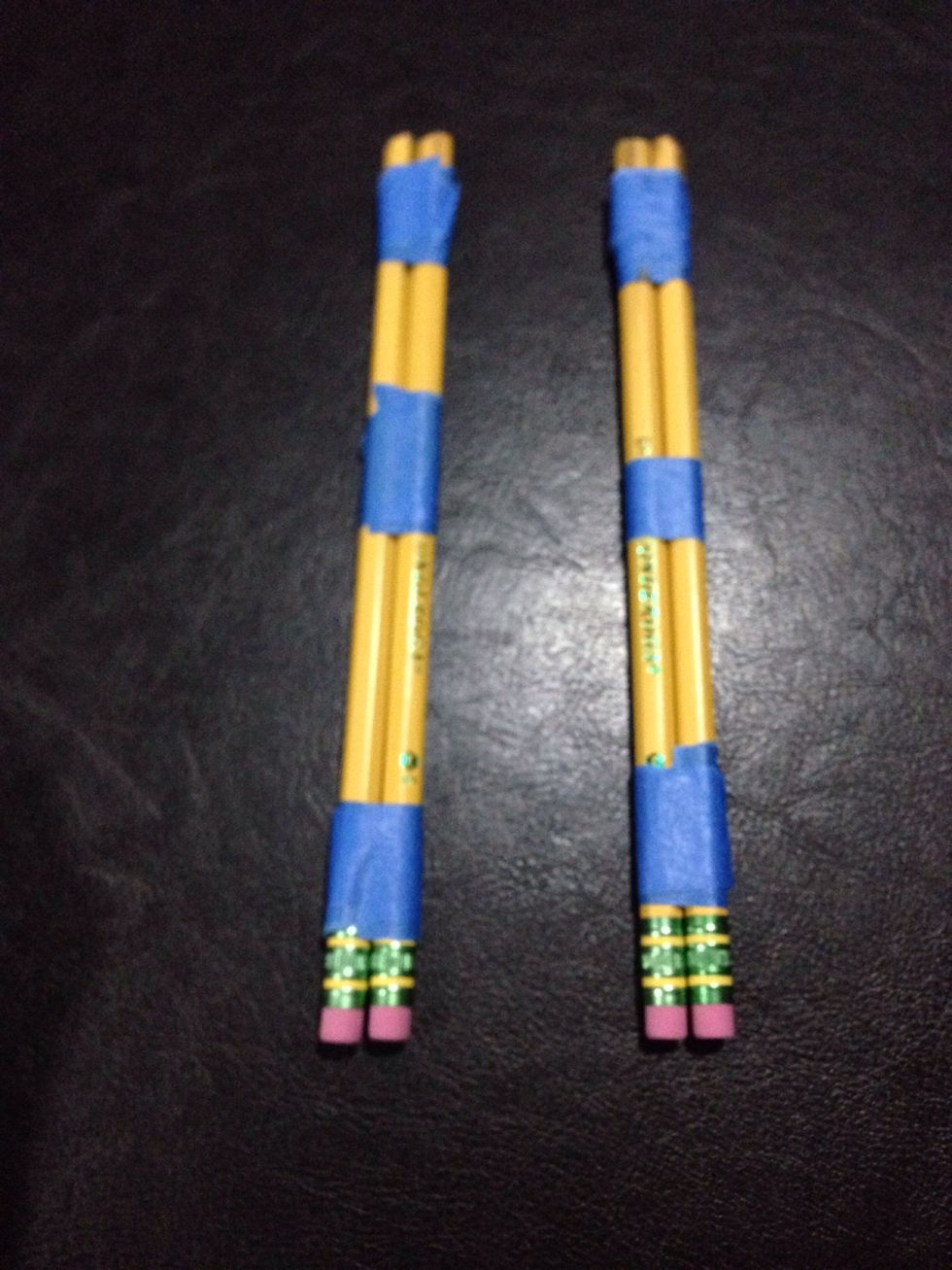 Repeat the step until you have a pair of a pair of 2 taped pencils