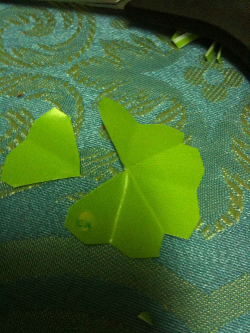 Repeat the steps for the second one except you have to cut two petals out of it (dont discard the cut petals as you would need it later)