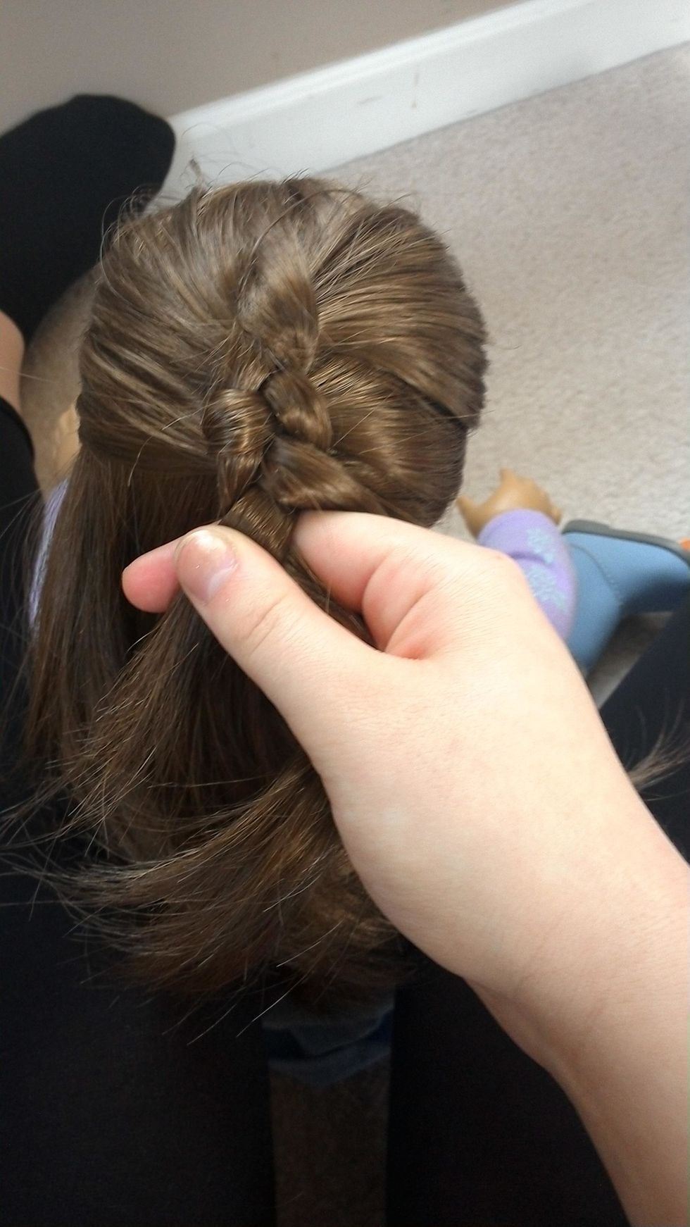 Repeat the steps of 4-6 for the right side of the head and steps 7-9 for the left side until you have used up all of the hair on either side. Remember to use fairly big chunks of hair when adding.