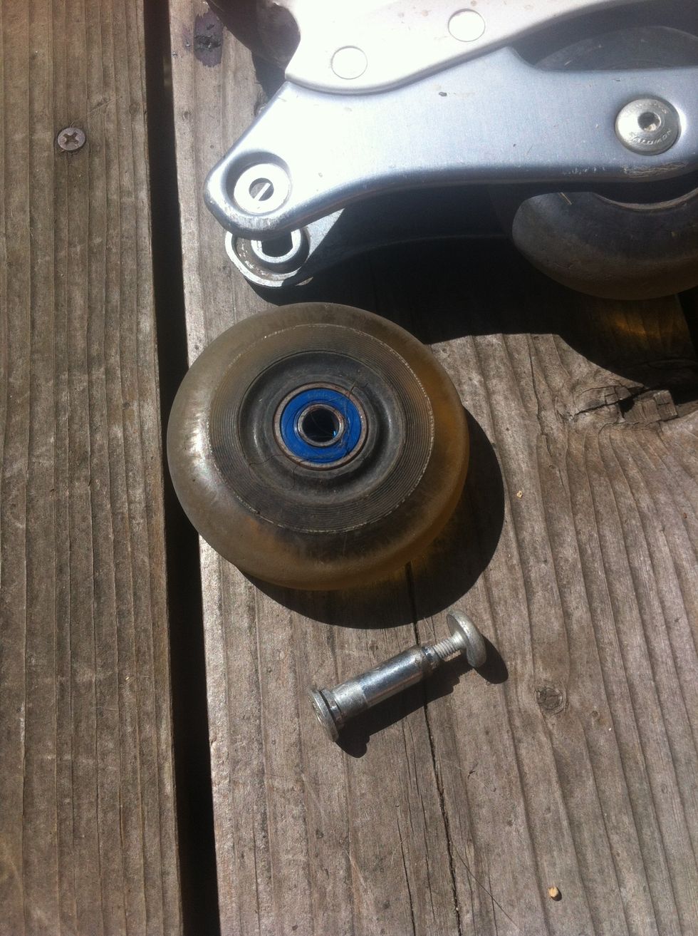 Repeat this for the rest of the wheels. I like to screw the axel parts back together so they don't get mixed up and are harder to lose.