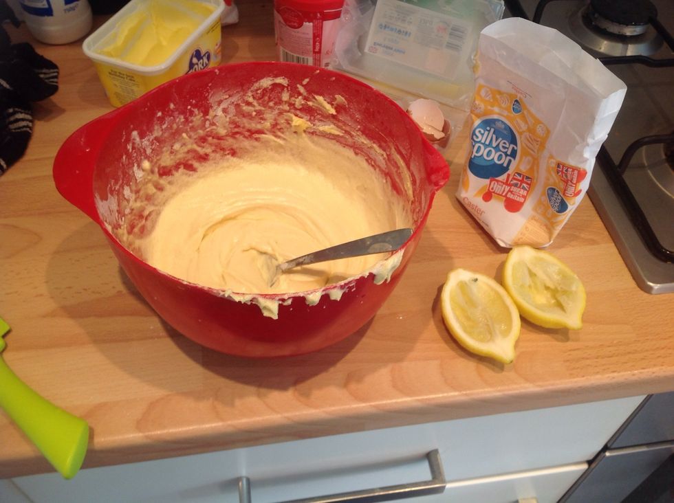 Repeat this process another two times so you end up with four slabs of sponge. In the last mix add the juice of a lemon a bit at a time until you can taste the lemon