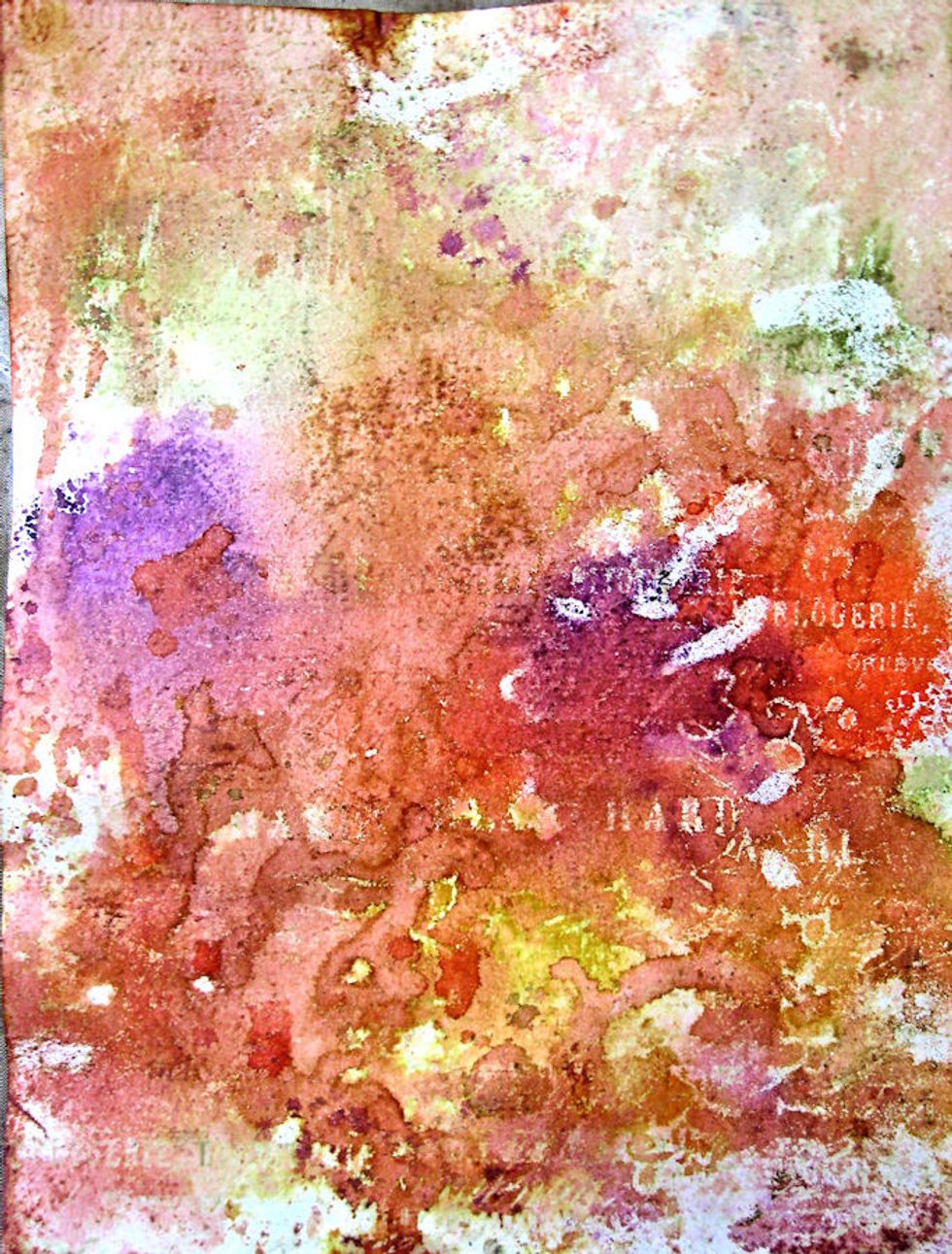 Repeat this process  of laying the inked side of the paper into the puddles of ink and drying each layer until you've used up all the ink on the craft sheet.