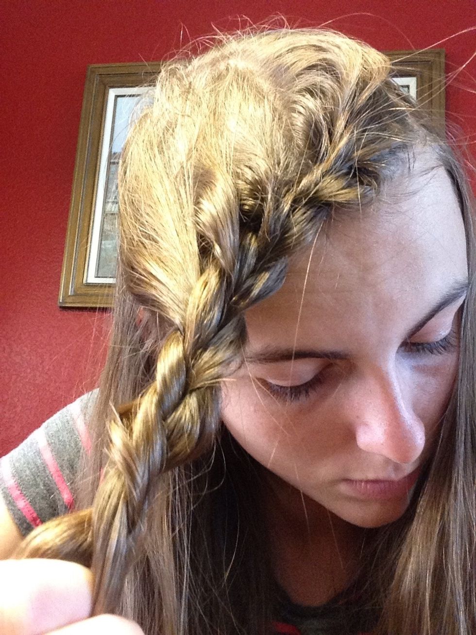 Repeat this process until the braid resembles a crown