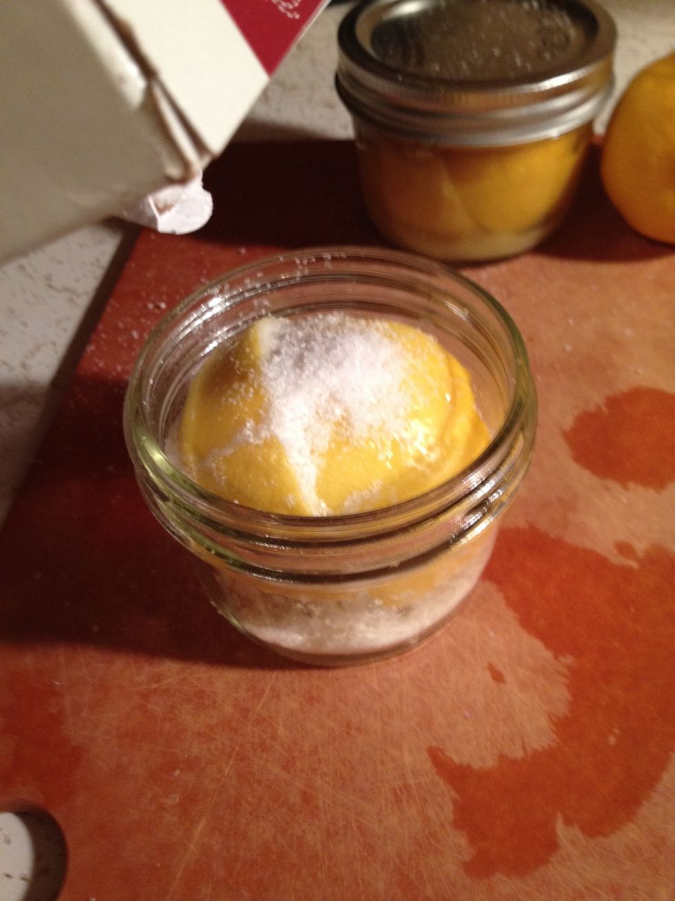 Repeat this step until your jar is full of lemons, adding salt as necessary so lemon is well coated