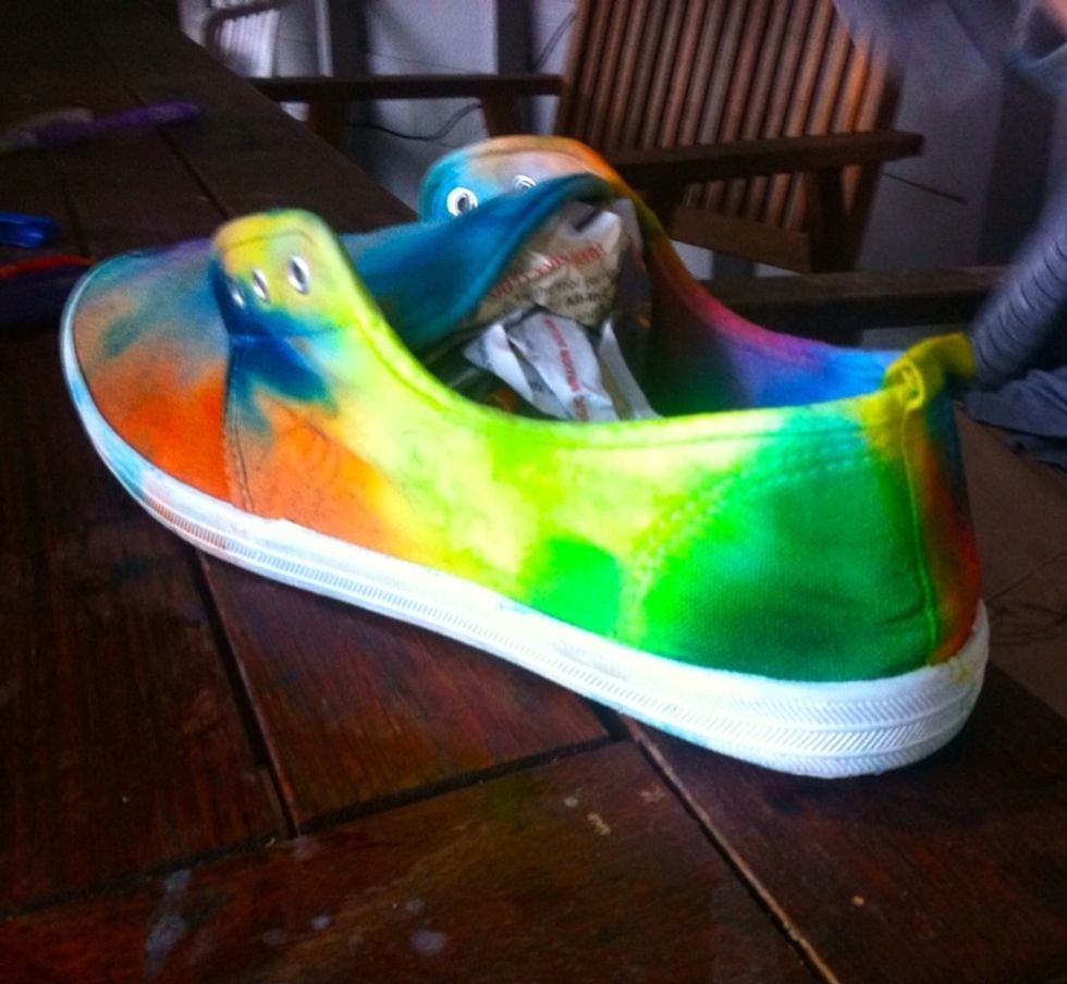 Repeat till all shoe is covered or yu are happy with it :) Place news paper on the inside of the shoe to dry