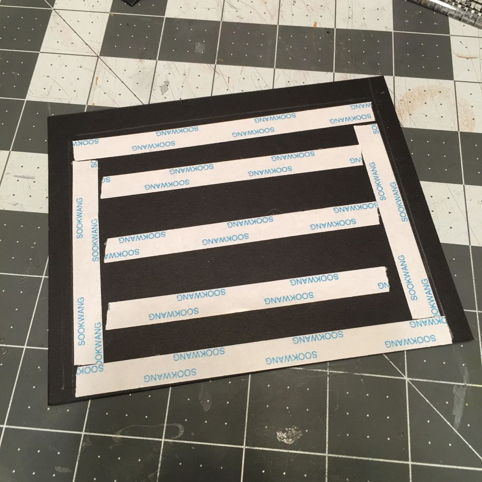 Repeat to attach the back cover. Apply scor-tape to the back side of the back cover within the pencil lines.