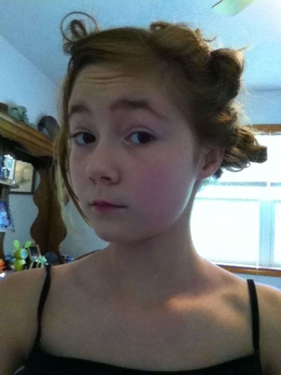 Repeat un till all your hair is up. I know I look funny but wait till you see the finished product !!!! (: