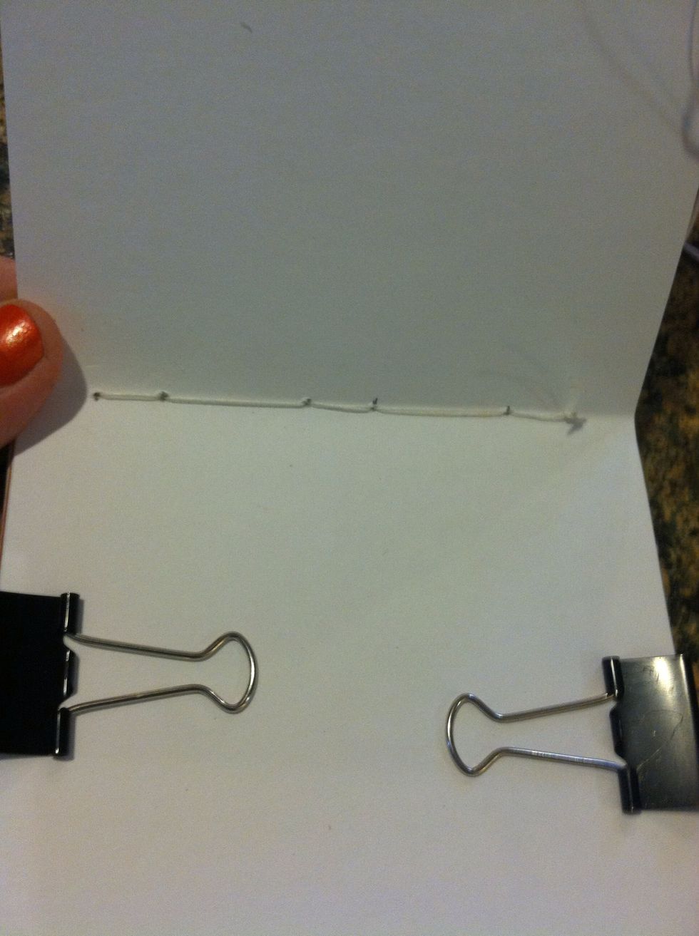 Repeat until you are on the end and inside your pages should look like this photo. On the last station, thread stays on the outside.