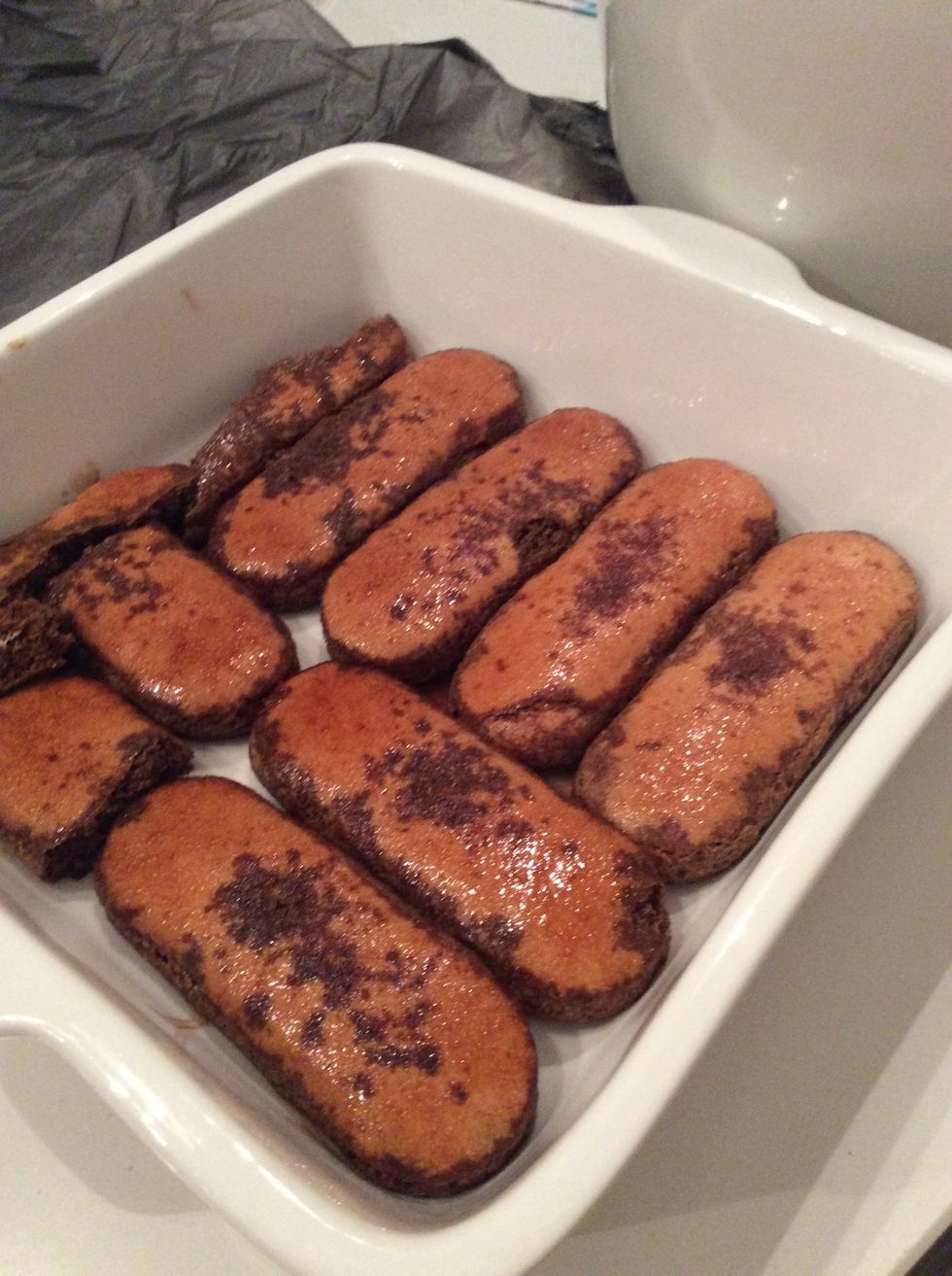 Repeat with a few more biscuits until the base is covered.