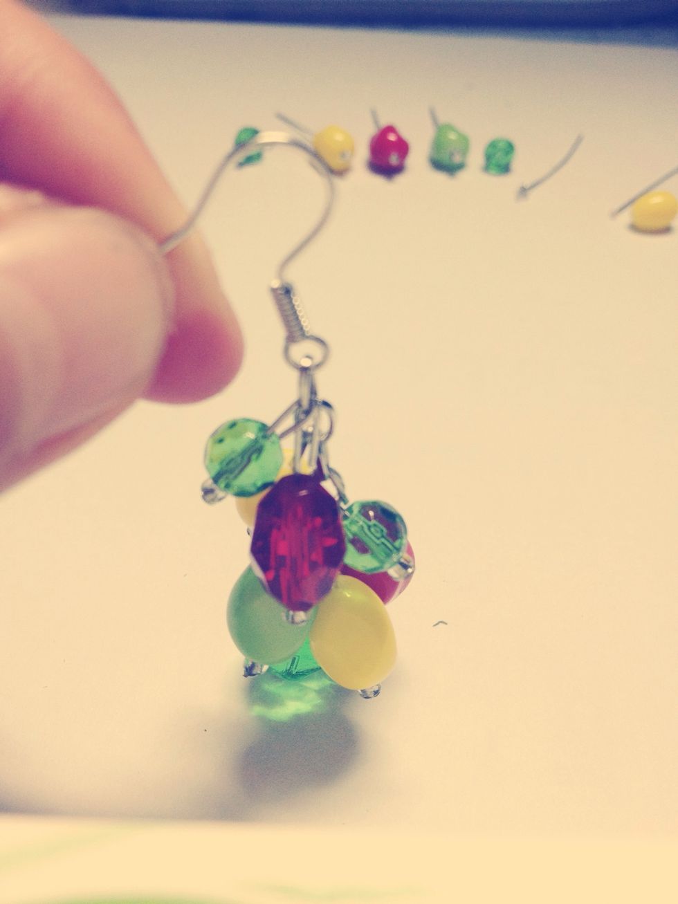 Repeat with all the other beads you wish to put on, putting biggest beads at the bottom and the smallest at the top.