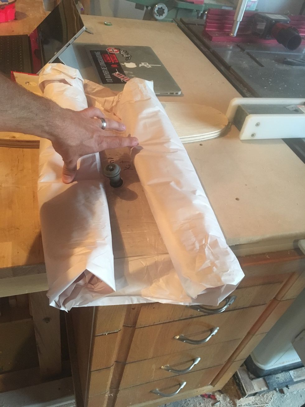 Repeat with open end of vacuum bag.