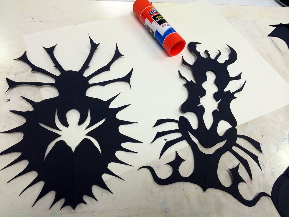 Repeat with other piece of black paper.