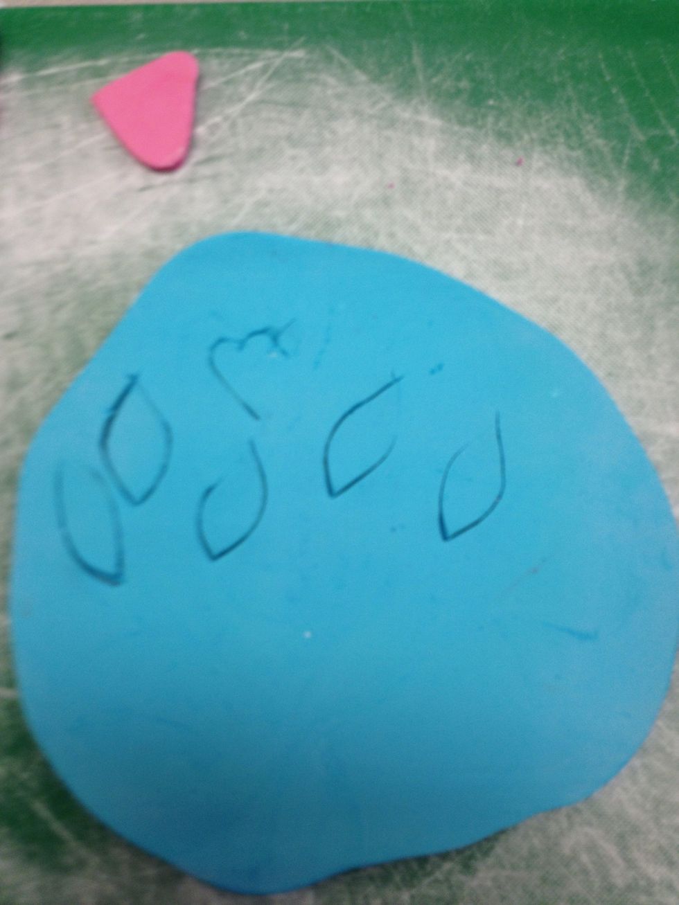 Repeat with the other coloured fondant