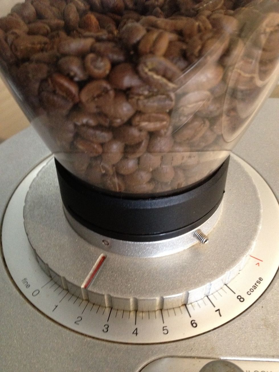 Replace hopper and refill with you coffee beans.