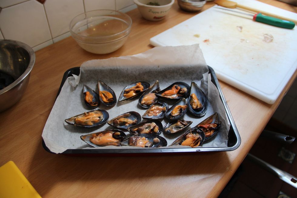 Replace mussels in shell.