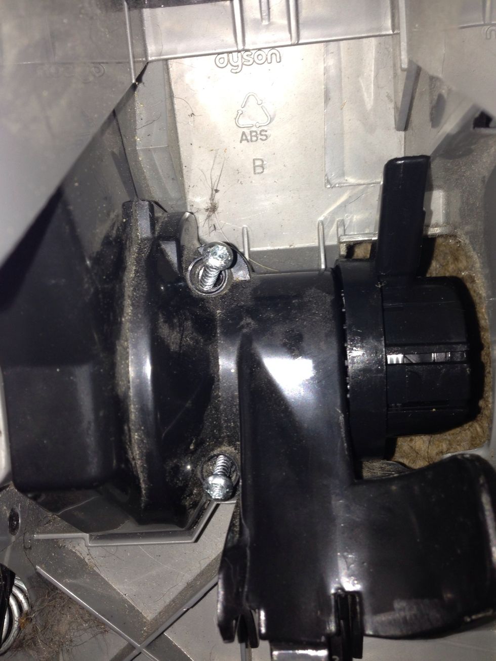 Replace the three torx #15 screws. Two are pictured here.