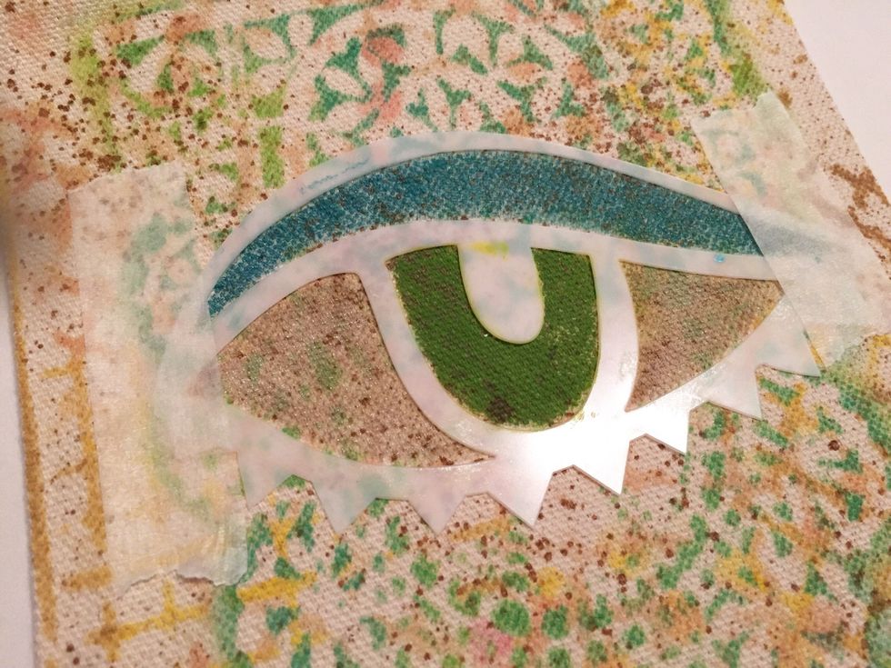 retape stencil over eye.
