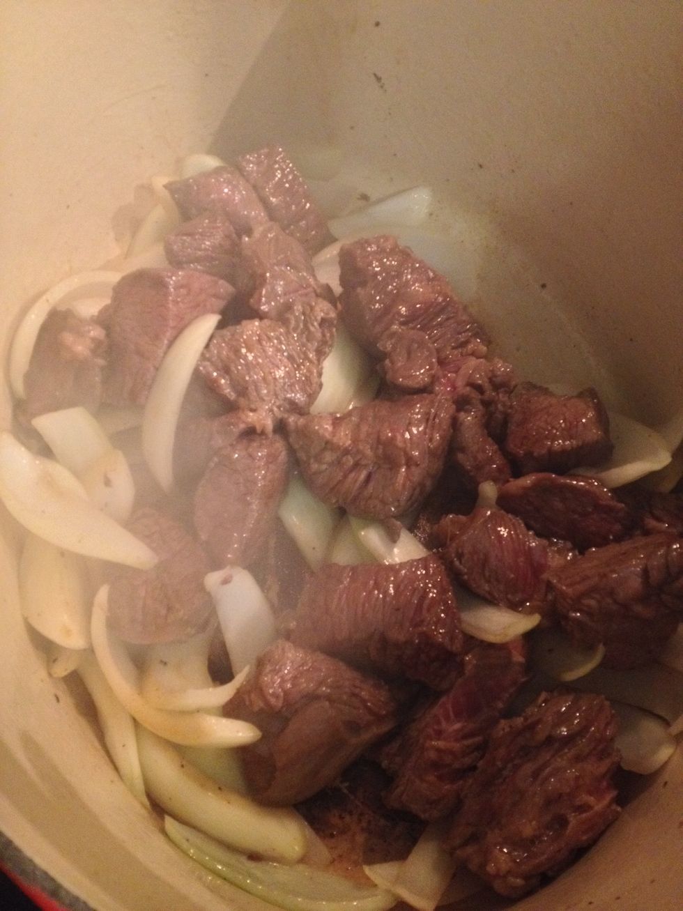 Return the beef into the pot.