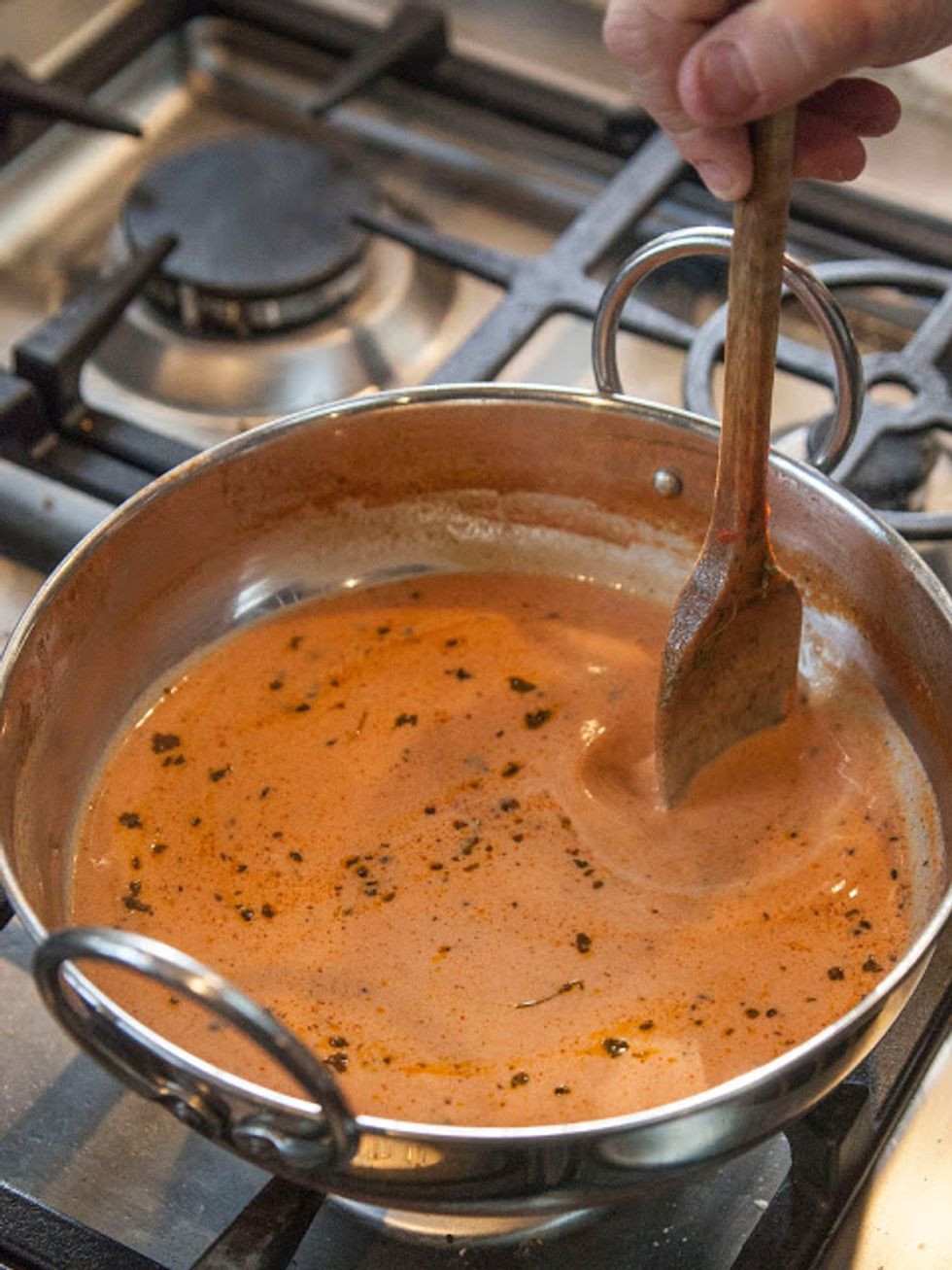 Rewarm the sauce, blending in the new ingredients. Watch the temp as you don't want this stuff to curdle! Simmer it gently and then set it aside. Time to make the zucchini pasta.