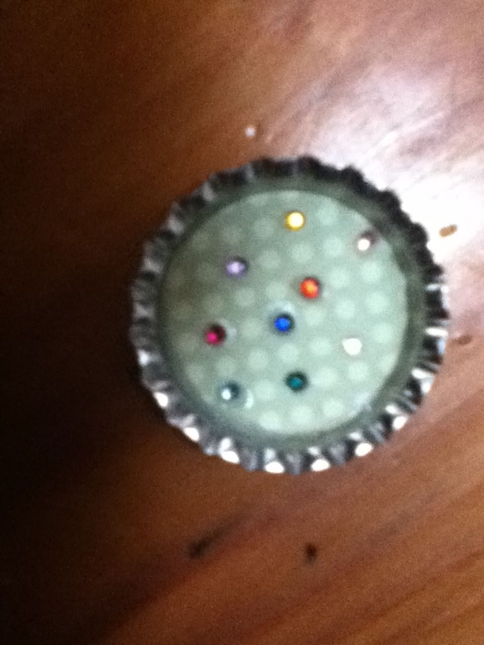 Rhinestoned paper. Let the lacquer dry for at least 5 minutes before continuing.