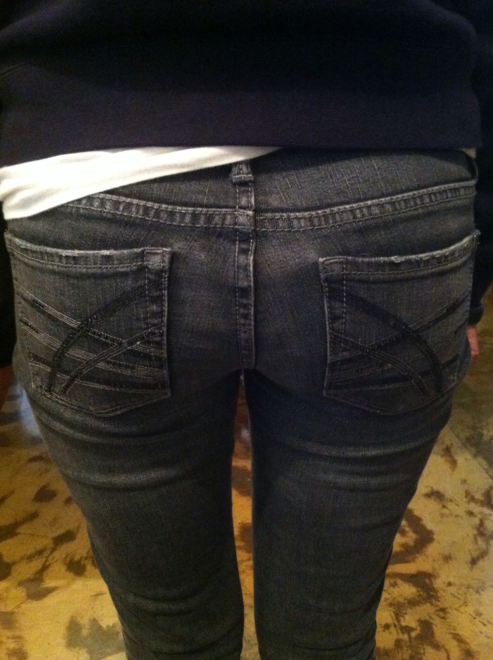 Rhinestones on the back of cheap jeans... Treat yo self.