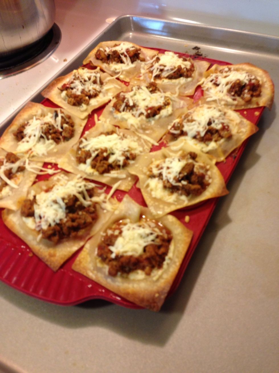 Right A out the same time the lasagna cups are done! Take them out of the oven and let them cool for a minute