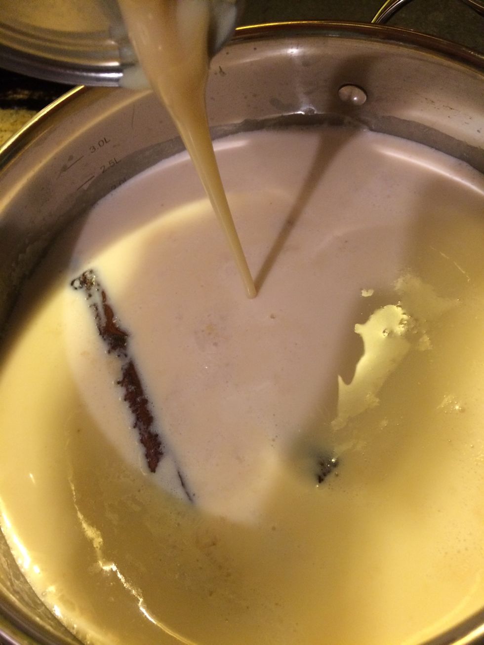 Right after evaporated milk has been added, now add on the sweetened condensed milk