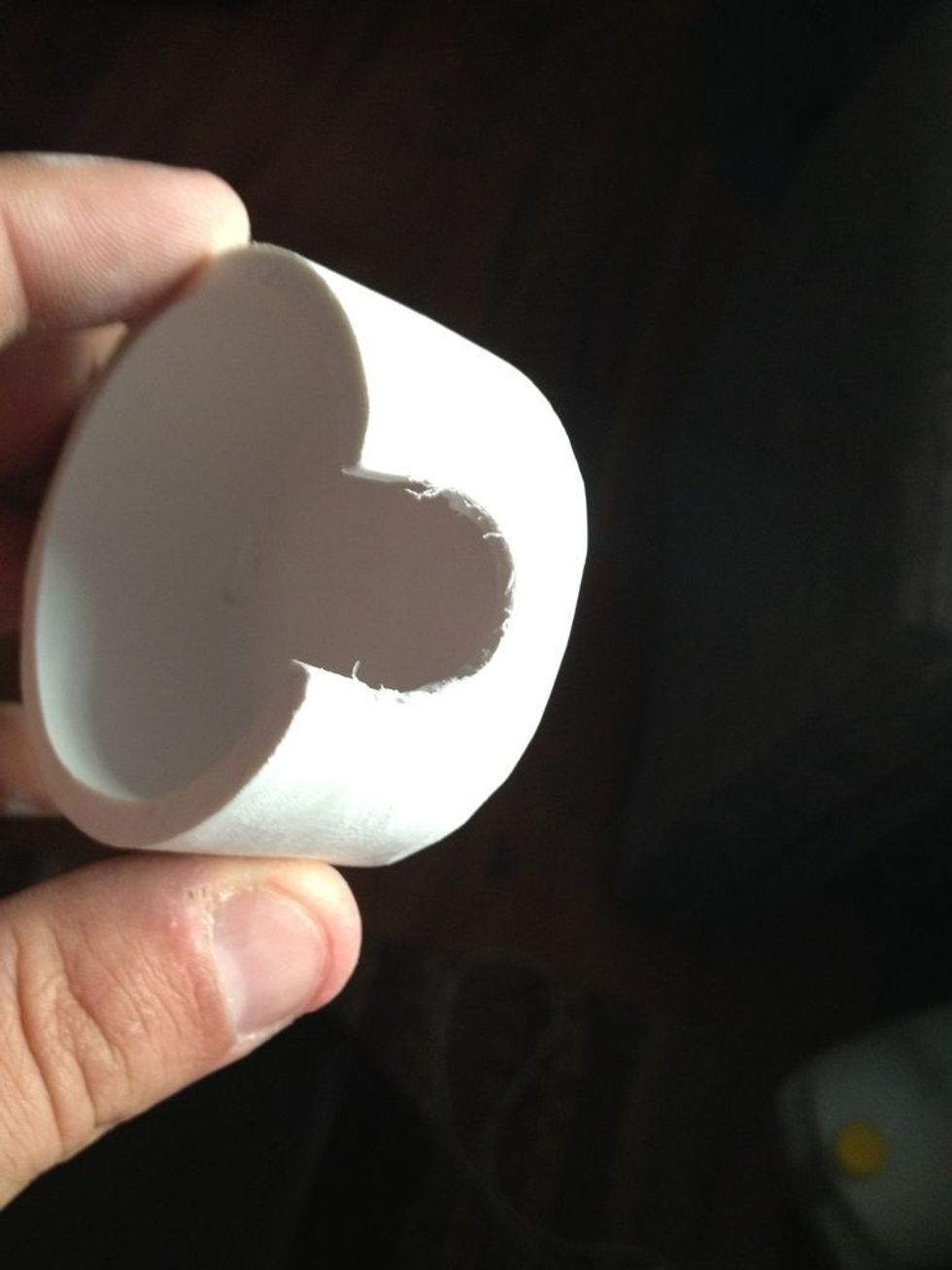 Right? Because if you don't, when you go to slide the dock elbow over the wall mount it'll get jammed. You can use a jigsaw or a hole saw bit, I used a 3/4" hole saw bit (drill bit).