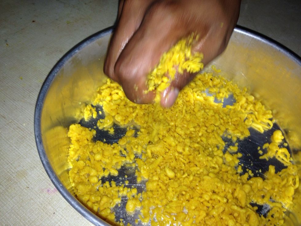 Right from the wok, while it is hot...squeeze excessive oil.