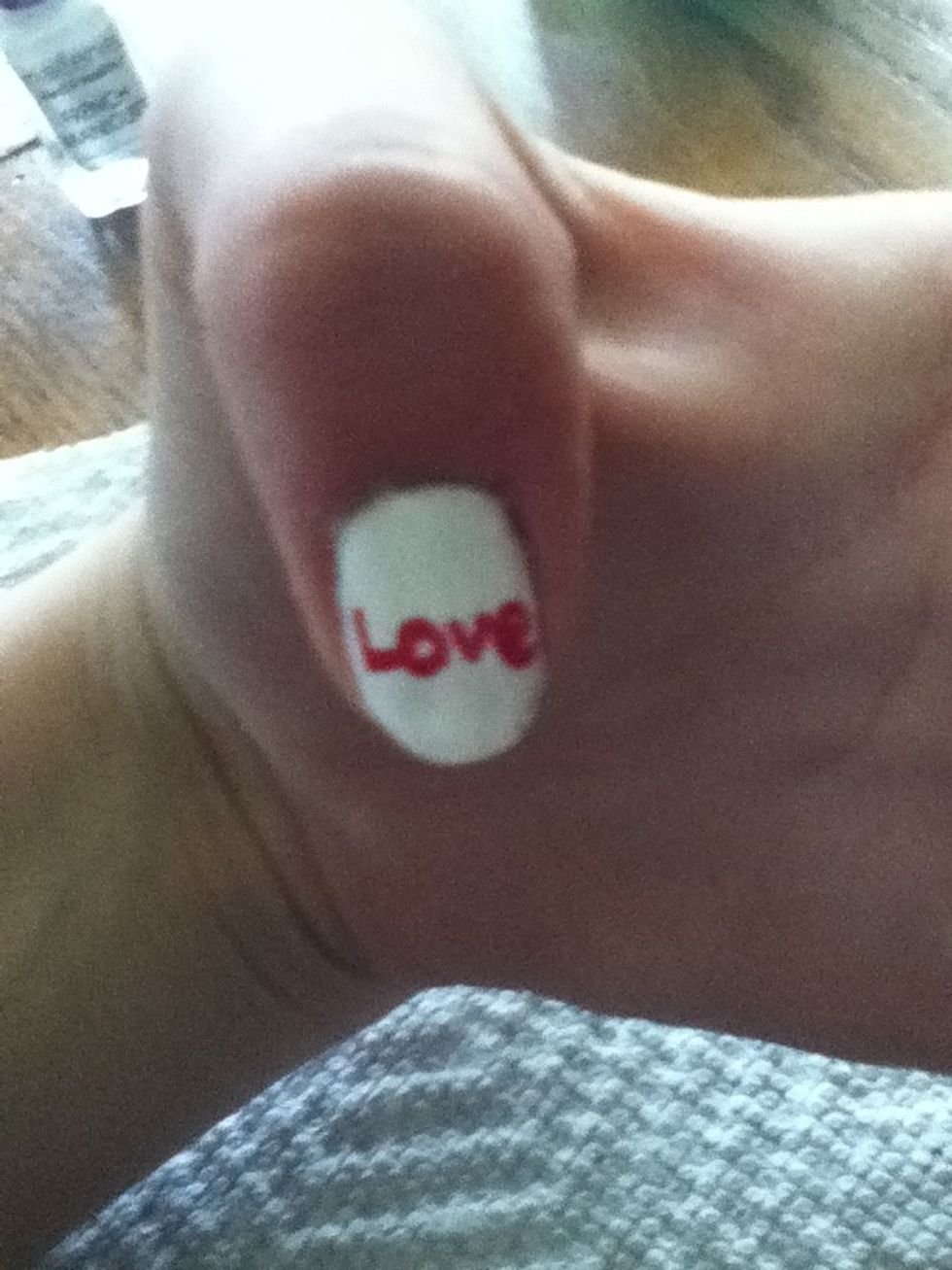 Right love on your pinky (you can use small brush but I find it easier to do it with dotter