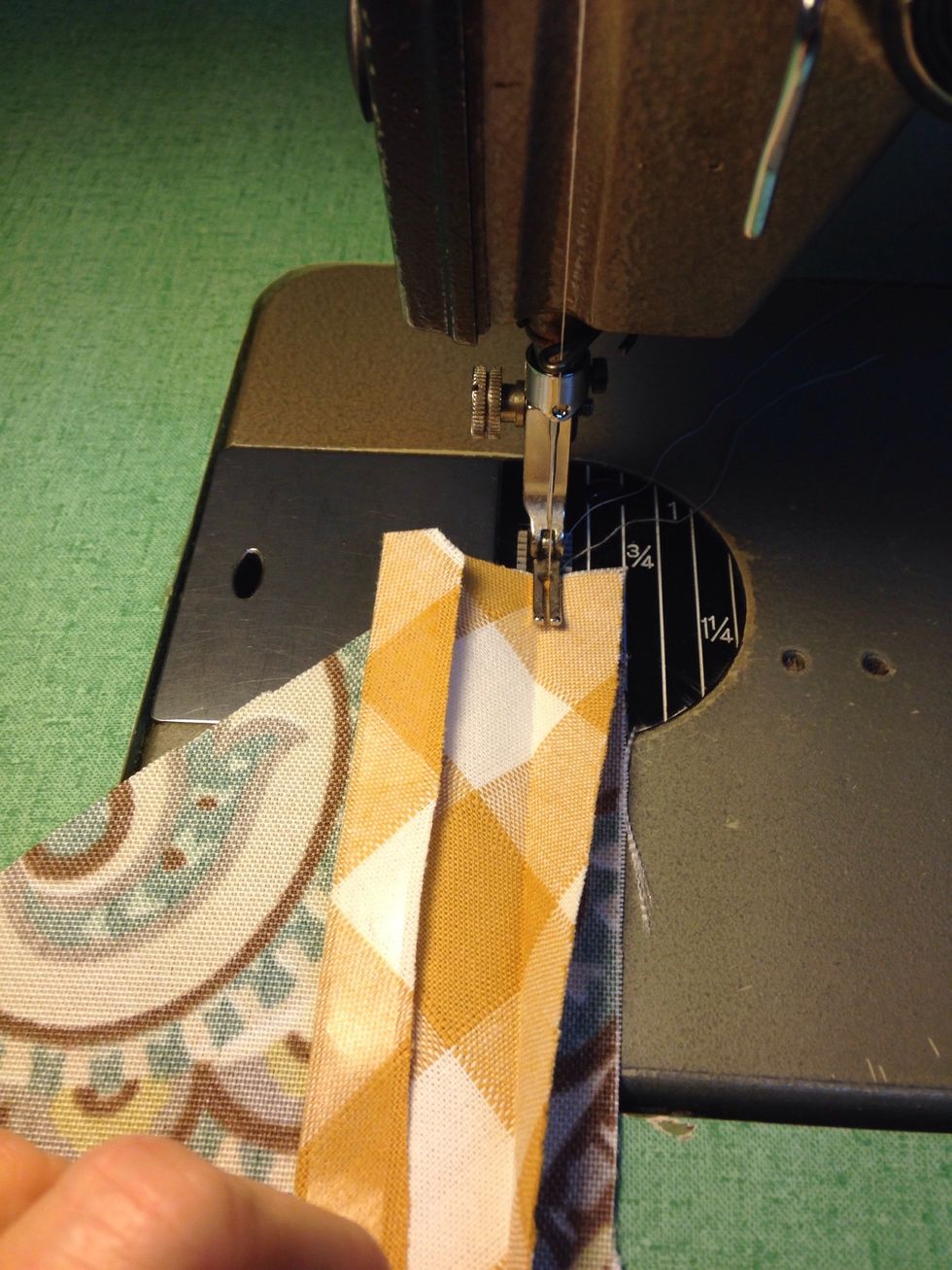 RIGHT side of banding to the WRONG side of pocket top, stitch bias banding to the top of each of the large and small POCKETS. For the reversible version apply the banding to decorative lining pockets