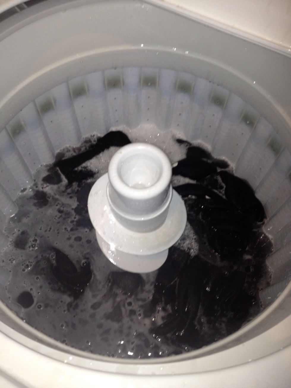 Ring water out of cloths (do not run through cycle, let the cycle drain once you've removed the cloths)