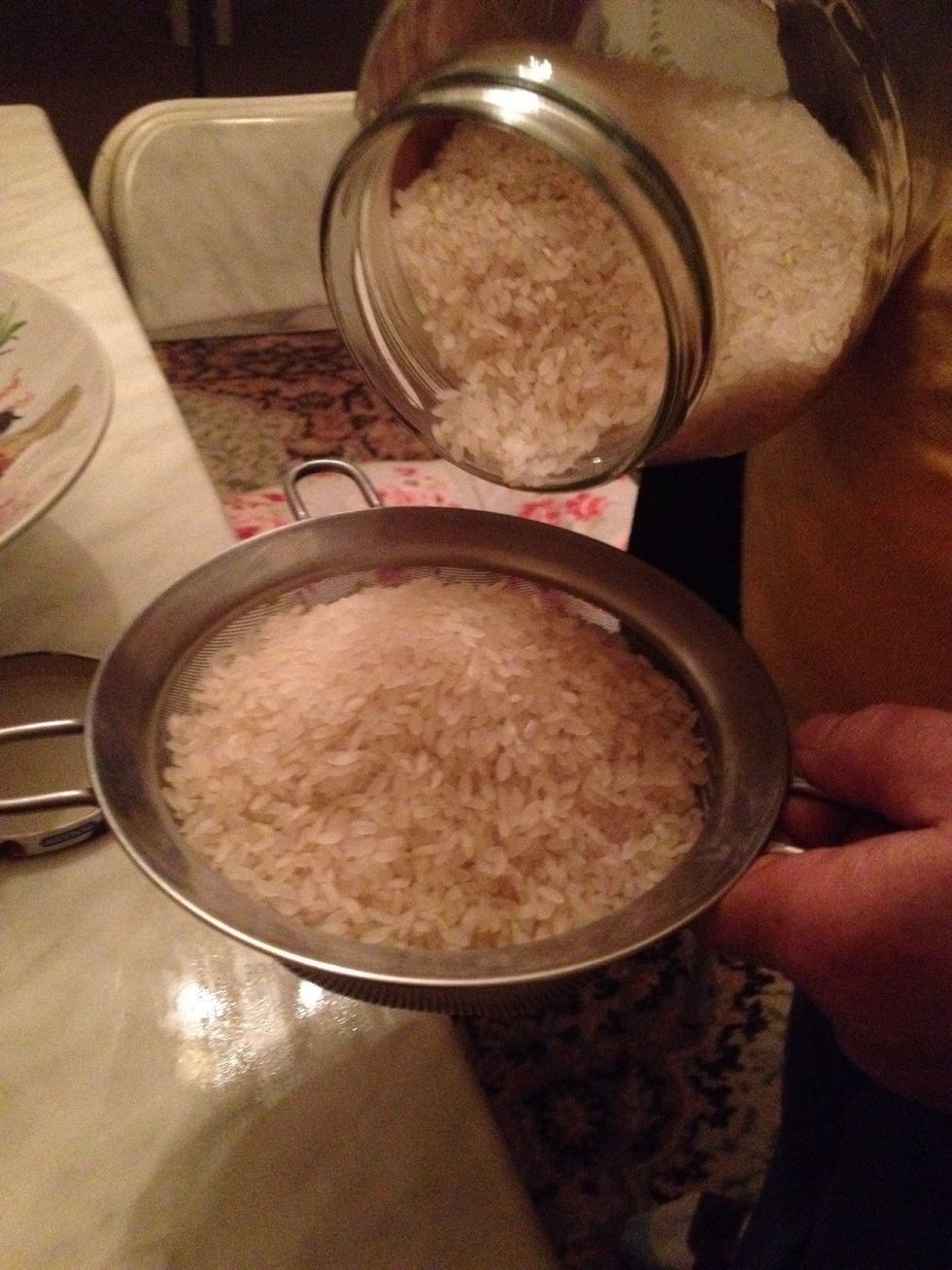 Rinse 2 cups of white rice. Do not use basmati or other Asian rice. You can use any type of white rice.