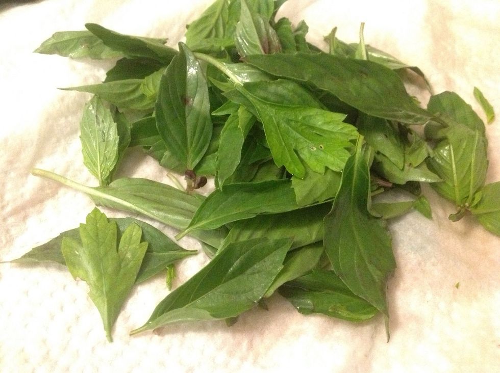 Rinse and then pluck the leaves from a goodly handful of basil. I threw in some flat leaf parsley too cuz why not, right?