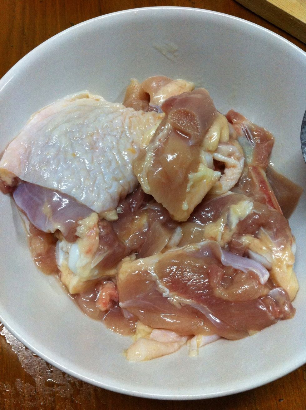 Rinse chicken in running water and cut into smaller pieces. I cut one thigh into 4 small pieces so the chicken will be cooked through quickly