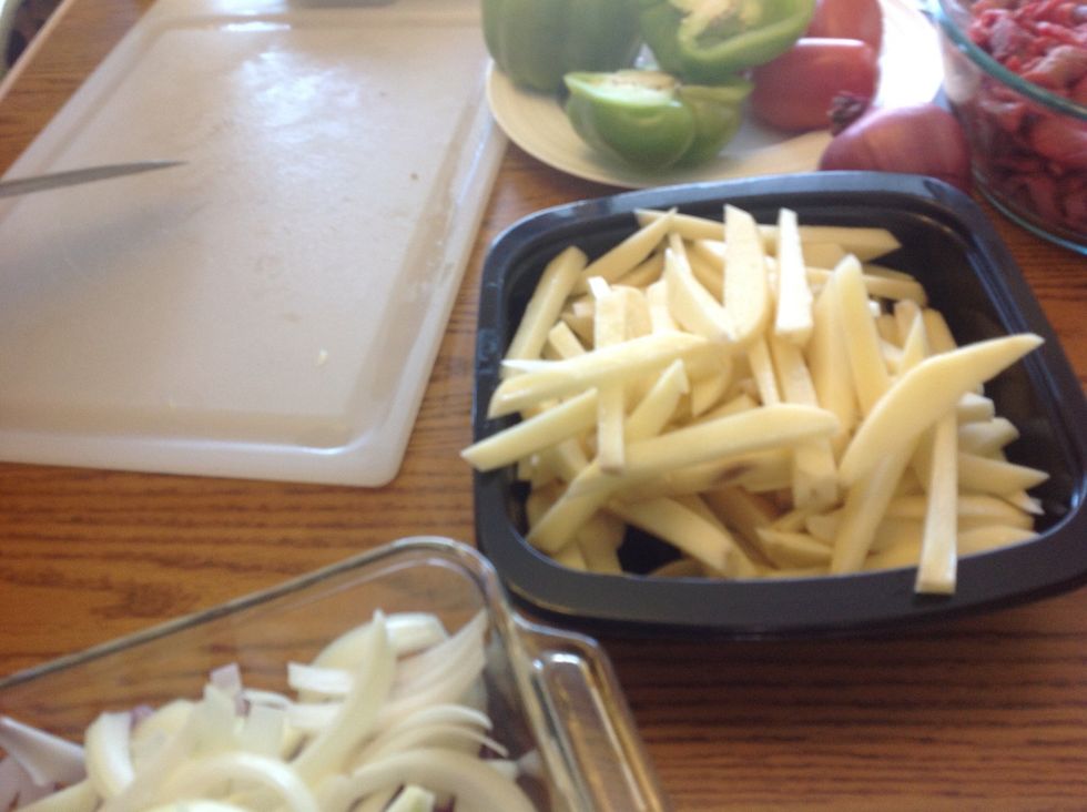 Rinse off and slice potatoes