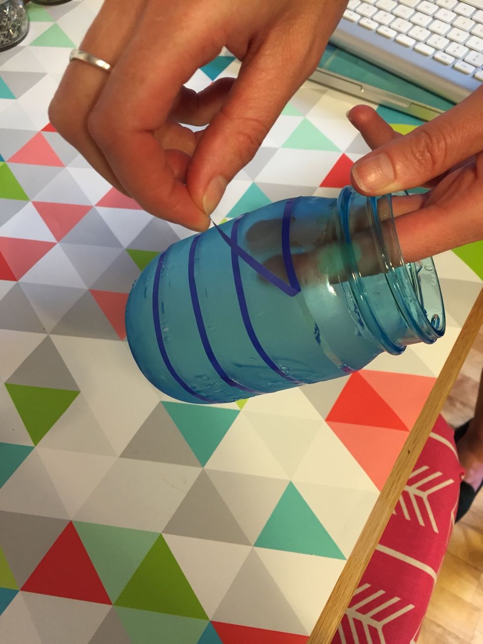 Rinse off the etching creme (be sure to keep your gloves on) and then remove the tape.