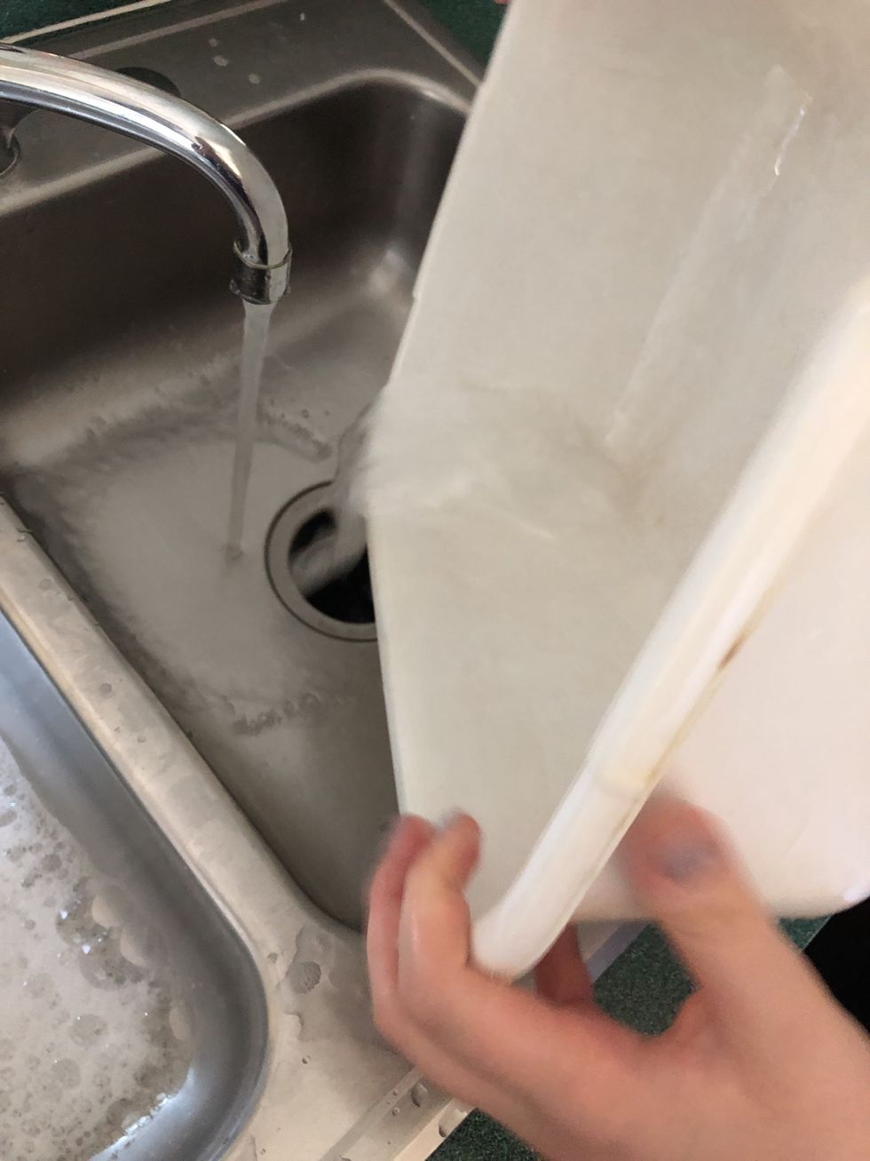 Rinse out dish tub