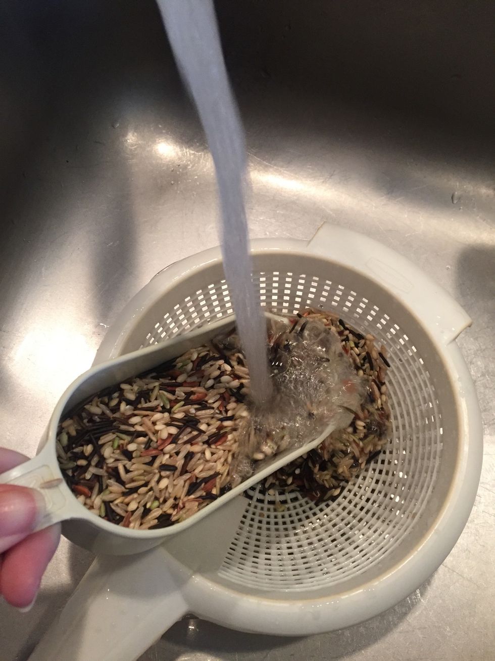 Rinse rice to remove excess starch.