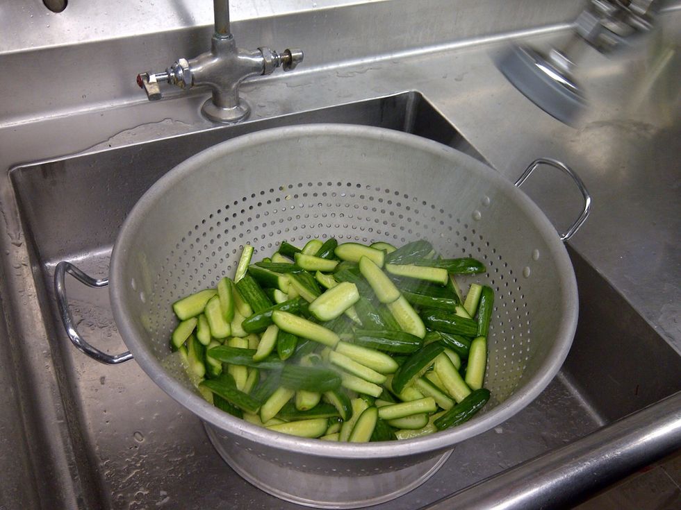 Rinse salt off cucumbers