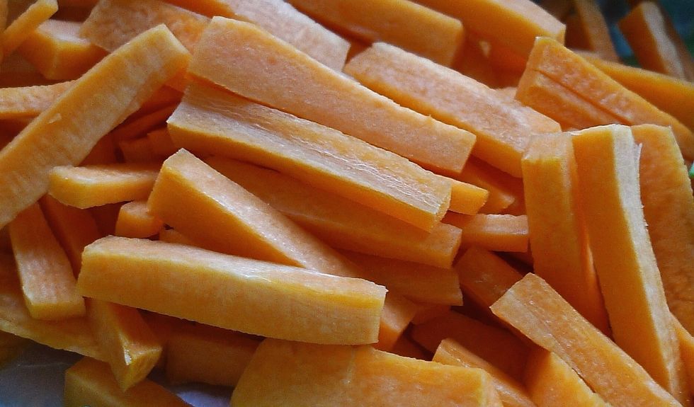 Rinse, skinned and cut carrots into strips.