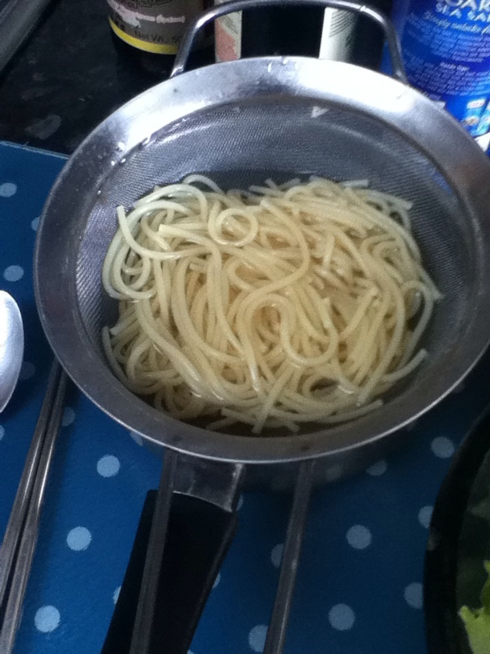 Rinse Spaghetti with cold water.