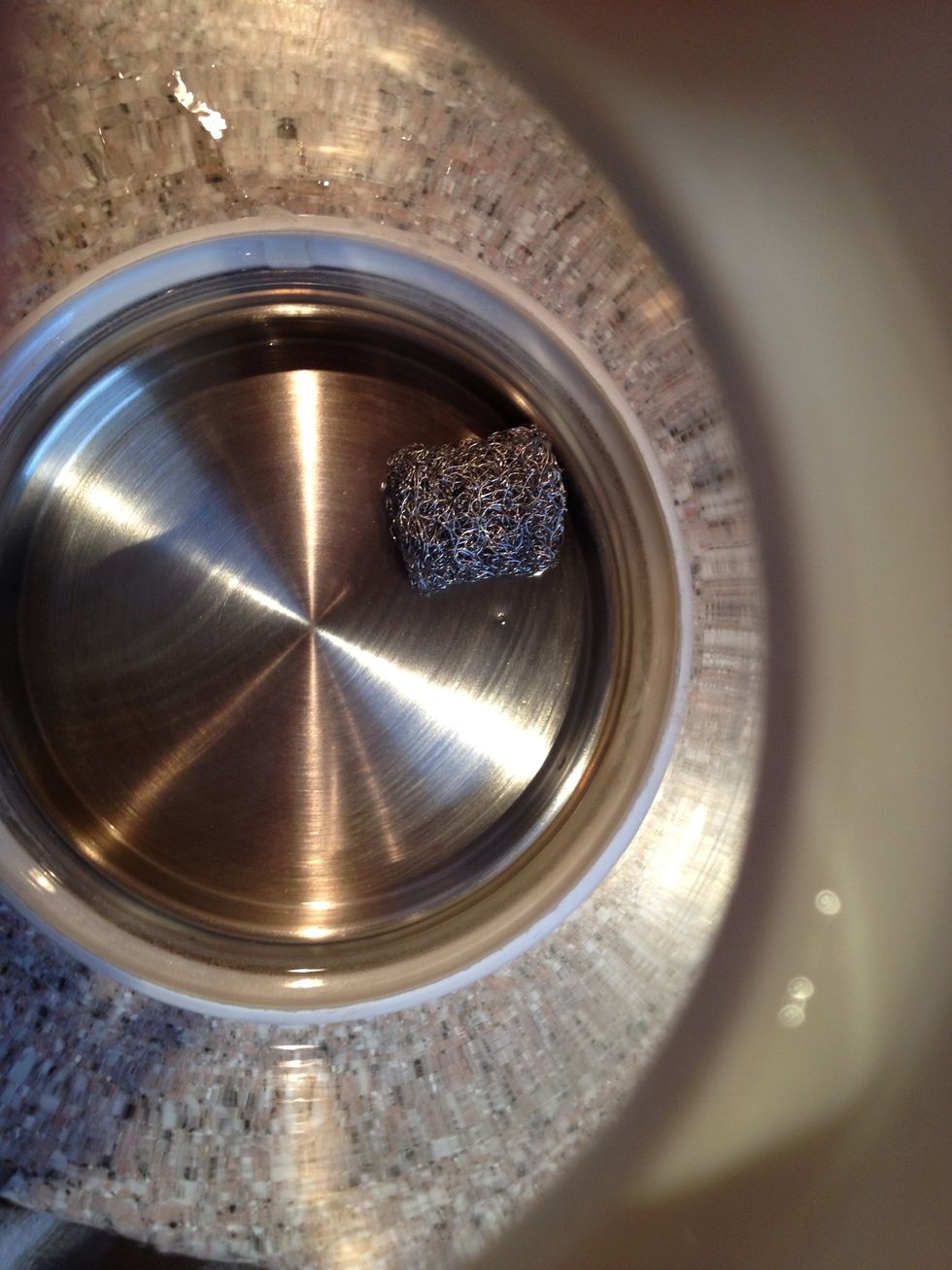 Rinse the kettle with water. If you have a lot of lime scale in your coffee machine, run the vinegar through a couple of times until it is clean. In the kettle leave the vinegar in over night.