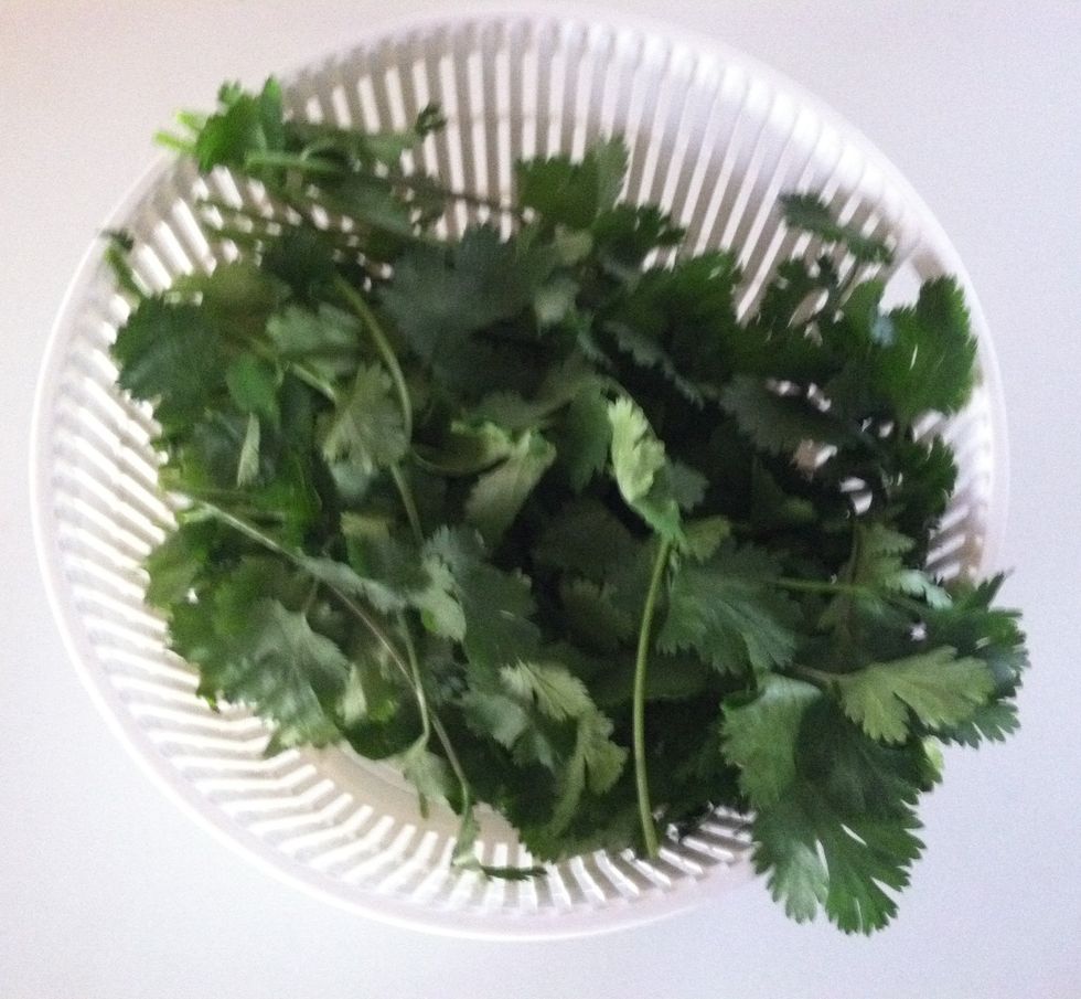 Rinse the leaves in a colander or a salad spinner.